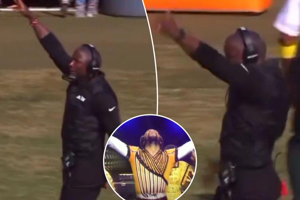 يتفاعل آرون جلين "جيتس" بعد أن ترقص رقصة الاحتفال الجانبي بالفيروسية مع الأرض والرياح والحرائق